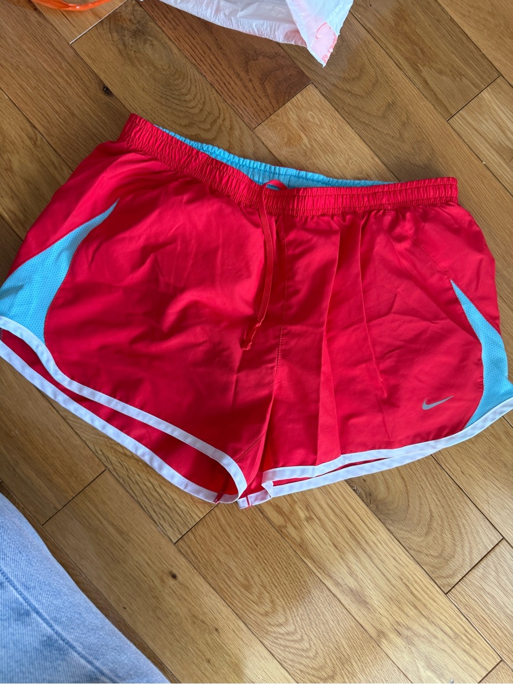 Nike Red Women's Athletic Running Shorts with Light Blue Accents